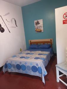 El Boquerón - Hospedaje房間的床