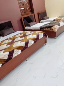 Lova arba lovos apgyvendinimo įstaigoje Kewat Homestays