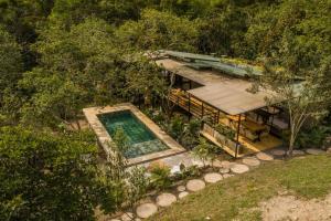 an overhead view of a house with a swimming pool at Ketana Eco Hotel in Sasaima
