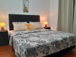 Postel nebo postele na pokoji v ubytování OBhouse Apartment, para sentirse como en casa!