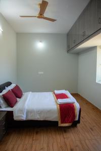 Voodi või voodid majutusasutuse JK - 4 BHK Villa toas