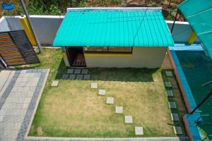 Aed väljaspool majutusasutust JK - 4 BHK Villa