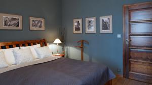 Postel nebo postele na pokoji v ubytování Redfoxapartment Central