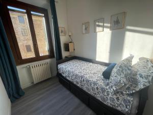 Postel nebo postele na pokoji v ubytování Casa Rosie