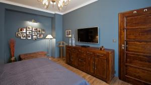Postel nebo postele na pokoji v ubytování Redfoxapartment Central