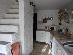 Kuchyň nebo kuchyňský kout v ubytování Le Clos des oliviers