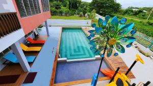 an overhead view of a swimming pool on a house at Pacific Paradise Villa in Sigatoka