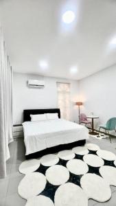 Ένα ή περισσότερα κρεβάτια σε δωμάτιο στο 27Jun