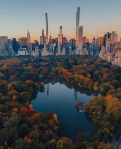 an aerial view of a city with a river at Sunny room on Manhattan’s Upper west side in New York