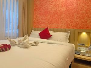 Letto o letti in una camera di Hotel Malati