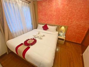 Letto o letti in una camera di Hotel Malati
