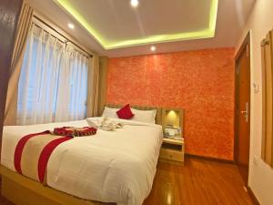 Letto o letti in una camera di Hotel Malati