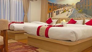 Letto o letti in una camera di Hotel Malati