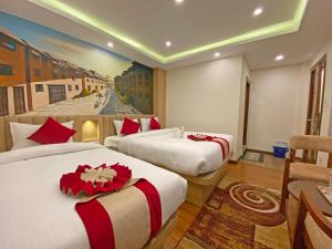 Letto o letti in una camera di Hotel Malati