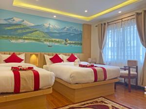 Letto o letti in una camera di Hotel Malati