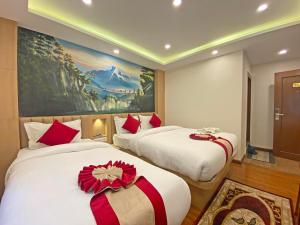 Letto o letti in una camera di Hotel Malati