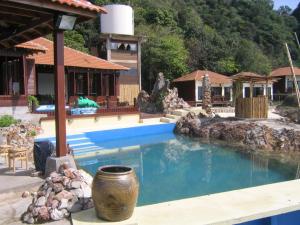 The swimming pool at or near Gem Island Resort & Spa