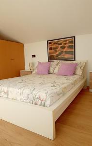 Posteľ alebo postele v izbe v ubytovaní Casa Evita