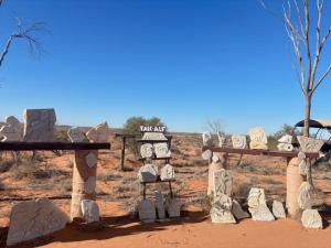 a group of stone statues in the desert at Lyndhurst hotel SA 