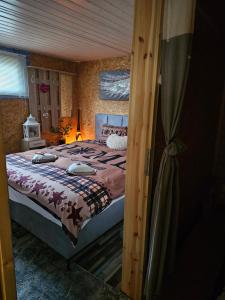 Letto o letti in una camera di Chez Gigi