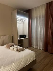 Postel nebo postele na pokoji v ubytování Shabby Home