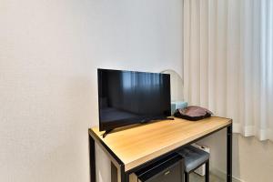 TV a/nebo společenská místnost v ubytování Ciel mini hotel