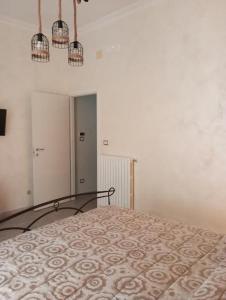 a bedroom with a bed in a room at La ninfa B&B in Salerno