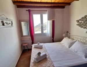 Maroussa's Apartments客房内的一张或多张床位
