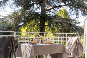 A balcony or terrace at Ladurnerhof Boutique Apartments Meran