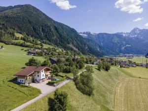 an aerial view of a village in the mountains at Apartment with panoramic view in Ramsau