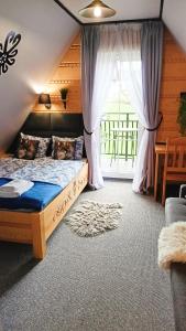 Fotografia z galérie ubytovania Apartament - Willa Na Górskim Szlaku v destinácii Murzasichle + 37 fotografií