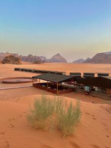 a building in the middle of the desert at Wadi rum sky luxury in Wadi Rum