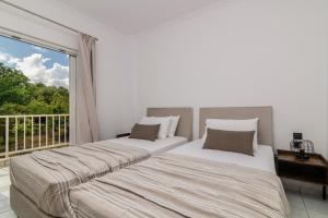 Postel nebo postele na pokoji v ubytování Swan Apartment 3