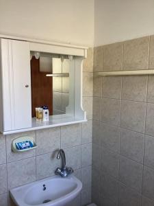 Ένα μπάνιο στο Vista del Mare Rooms 1