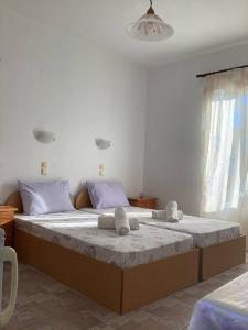 Ένα ή περισσότερα κρεβάτια σε δωμάτιο στο Vista del Mare Rooms 1