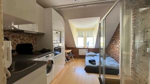 Posteľ alebo postele v izbe v ubytovaní Věžička u Vřídla (Tower apartment in centre)
