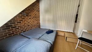 Posteľ alebo postele v izbe v ubytovaní Věžička u Vřídla (Tower apartment in centre)