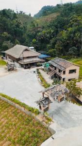 an aerial view of a building with a roof at Local Ban Bang Homestay - Motorbike rental and Tour in Ha Giang