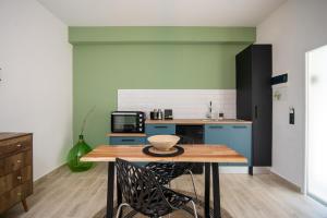 Kuchyň nebo kuchyňský kout v ubytování Armoniahousesuites