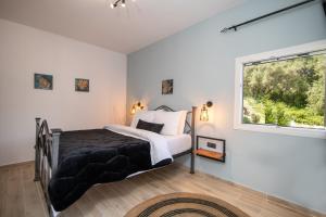 Postel nebo postele na pokoji v ubytování Armoniahousesuites