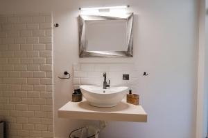 Koupelna v ubytování Armoniahousesuites