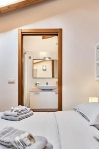 Ένα ή περισσότερα κρεβάτια σε δωμάτιο στο Appartamento Dilva