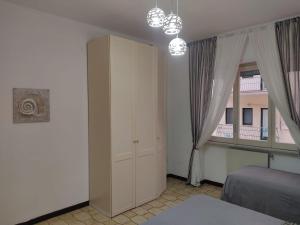 A bed or beds in a room at Vallese Holiday Home Apartment Maiori