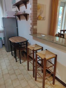 A kitchen or kitchenette at Vallese Holiday Home Apartment Maiori