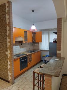 A kitchen or kitchenette at Vallese Holiday Home Apartment Maiori