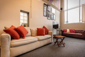 a living room with a couch and a table at Not A Bank in Tomales