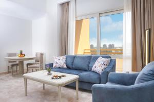 Posezení v ubytování Triumph Plaza Hotel
