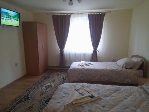 Foto dalla galleria di Cazare Slivuț Prislop a Silvaşu de Jos