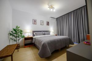 Ένα ή περισσότερα κρεβάτια σε δωμάτιο στο Luxury TES Apartment