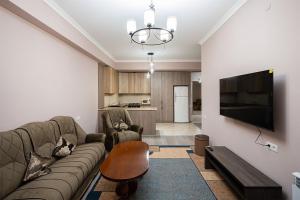 Η κουζίνα ή μικρή κουζίνα στο New Kond appartment